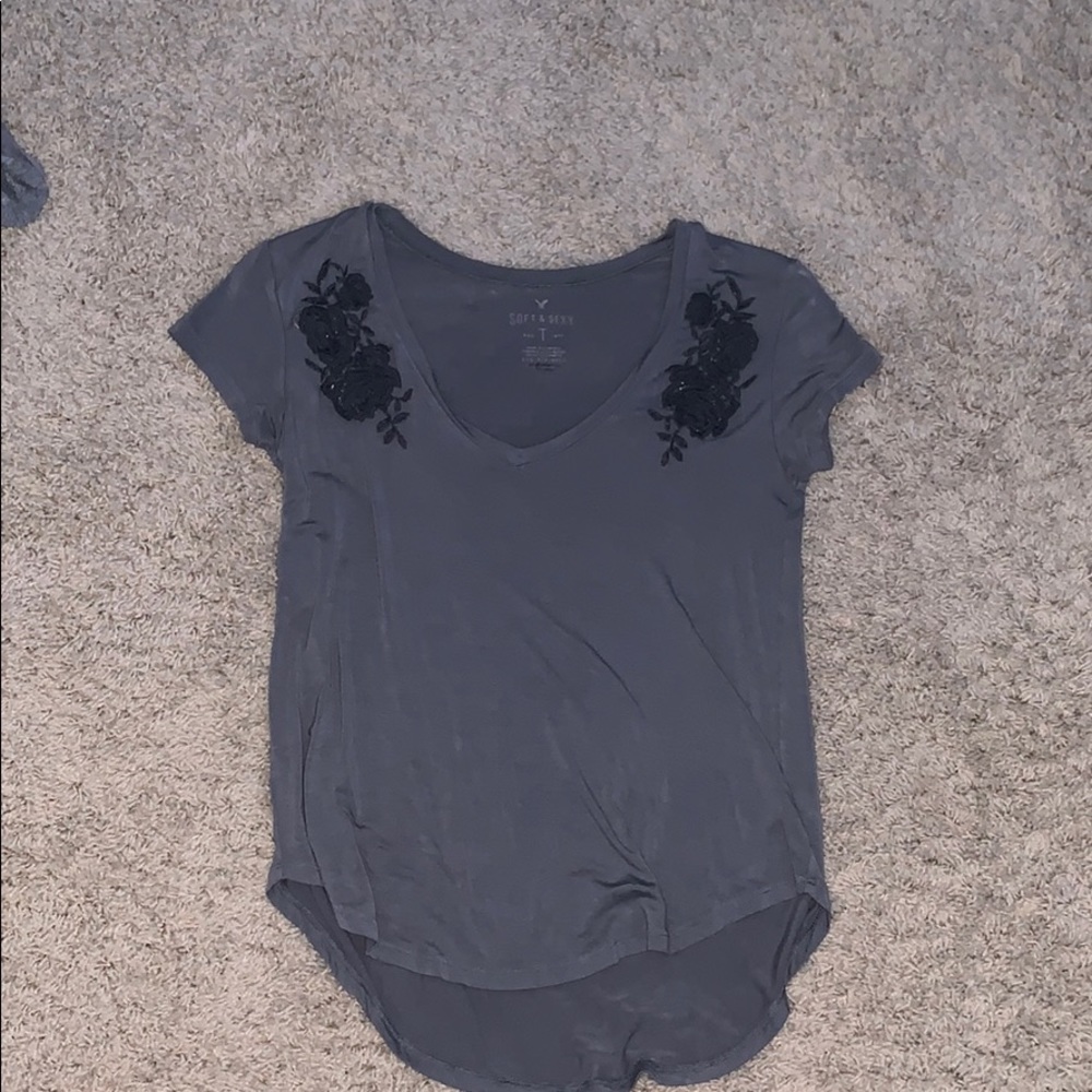 grey flowy v neck shirt